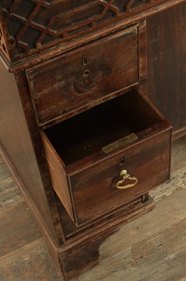 Lot 1627 - A GEORGE III MAHOGANY CHIPPENDALE STYLE KNEEHOLE DESK
