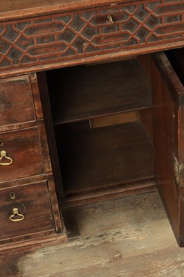 Lot 1627 - A GEORGE III MAHOGANY CHIPPENDALE STYLE KNEEHOLE DESK