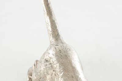 Lot 219 - A LARGE EARLY 20TH CENTURY GERMAN SILVER MODEL OF A DOG