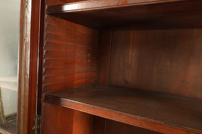 Lot 1623 - A LARGE EARLY 19TH CENTURY FLAMED MAHOGANY BREAKFRONT BOOKCASE IN THE MANNER OF GILLOWS