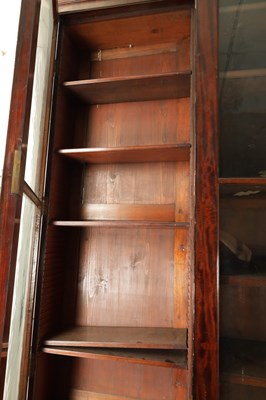 Lot 1623 - A LARGE EARLY 19TH CENTURY FLAMED MAHOGANY BREAKFRONT BOOKCASE IN THE MANNER OF GILLOWS