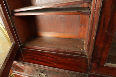 Lot 1623 - A LARGE EARLY 19TH CENTURY FLAMED MAHOGANY BREAKFRONT BOOKCASE IN THE MANNER OF GILLOWS