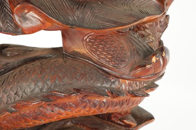 Lot 132 - A LATE 19TH CENTURY CARVED HARDWOOD FIGURE OF A WARRIOR STANDING ON A DRAGON