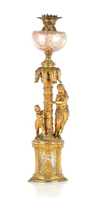 Lot 806 - A LATE 19TH CENTURY GILT METAL FIGURAL OIL LAMP BASE OF GOTHIC DESIGN
