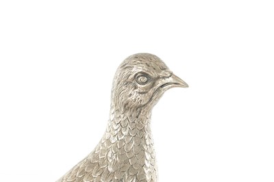 Lot 232 - AN EARLY 20TH CENTURY CAST SILVER SCULPTURE OF A PHEASANT