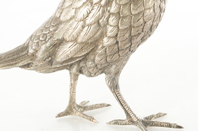Lot 232 - AN EARLY 20TH CENTURY CAST SILVER SCULPTURE OF A PHEASANT