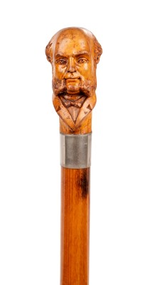 Lot 1077 - A LATE 19TH CENTURY CARVED BUST HANDLED WALKING STICK