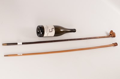 Lot 118 - TWO LATE 19TH CENTURY FOLK ART CARVED HEAD WALKING STICKS