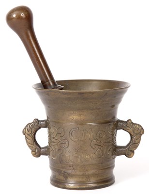 Lot 346 - AN EARLY 18TH CENTURY BRONZE DATED PESTLE AND...