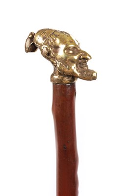 Lot 1055 - A LATE 19TH CENTURY WEIGHTED BRASS HANDLED 'KNOBKERRIE TYPE' WALKING STICK