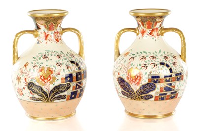 Lot 40 - A PAIR OF 19TH CENTURY COPELAND SPODE IMARI PATTERN CERAMIC ENGLISH BOTTLE VASES