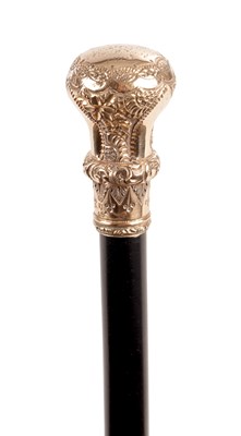Lot 1080 - AN EARLY 20TH CENTURY CONTINENTAL FINELY ENGRAVED GILT METAL WALKING STICK