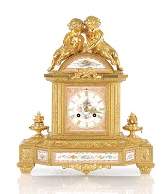 Lot 1495 - A LATE 19TH CENTURY FRENCH PORCELAIN PANELLED ORMOLU MATEL CLOCK