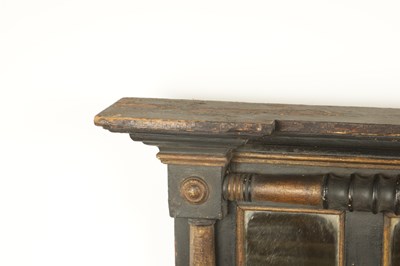 Lot 1694 - A SMALL REGENCY EBONISED AND GILT OVERMANTEL MIRROR