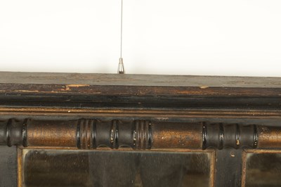 Lot 1694 - A SMALL REGENCY EBONISED AND GILT OVERMANTEL MIRROR