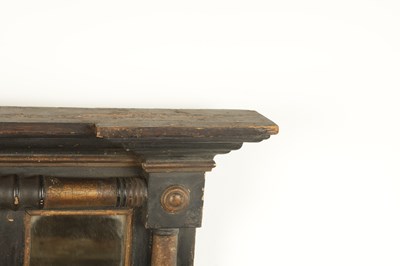 Lot 1694 - A SMALL REGENCY EBONISED AND GILT OVERMANTEL MIRROR