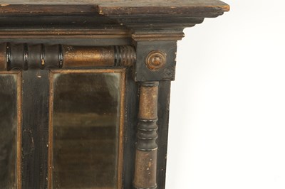 Lot 1694 - A SMALL REGENCY EBONISED AND GILT OVERMANTEL MIRROR