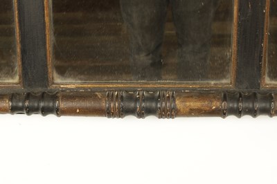 Lot 1694 - A SMALL REGENCY EBONISED AND GILT OVERMANTEL MIRROR