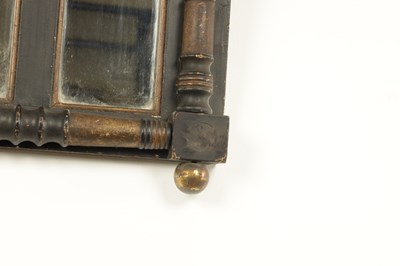 Lot 1694 - A SMALL REGENCY EBONISED AND GILT OVERMANTEL MIRROR