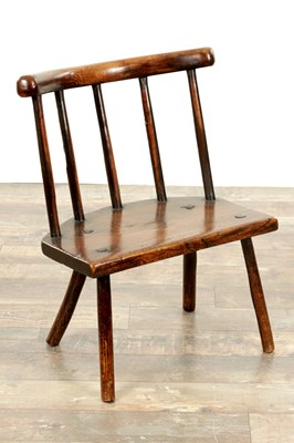 Lot 1660 - AN 18TH CENTURY WELSH PRIMITIVE ASH AND ELM STICK BACK CHAIR