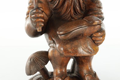 Lot 961 - A LATE 19TH CENTURY BLACK FOREST COBBLER TOBACCO JAR AND MATCH HOLDER OF LARGE SIZE
