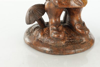 Lot 961 - A LATE 19TH CENTURY BLACK FOREST COBBLER TOBACCO JAR AND MATCH HOLDER OF LARGE SIZE