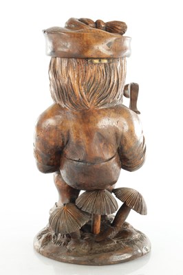 Lot 961 - A LATE 19TH CENTURY BLACK FOREST COBBLER TOBACCO JAR AND MATCH HOLDER OF LARGE SIZE
