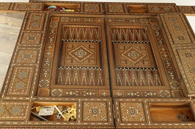 Lot 1659 - A 19TH CENTURY SYRIAN MOSAIC MARQUETRY MOTHER OF PEARL INLAID GAMES TABLE