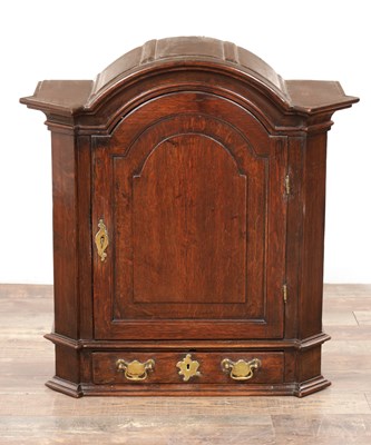 Lot 1603 - A MID 18TH CENTURY OAK HANGING SPICE CUPBOARD
