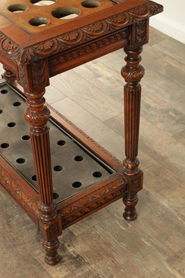 Lot 1753 - A LATE 19TH CENTURY WALNUT STICK STAND IN THE MANNER OF LAMBS OF MANCHESTER