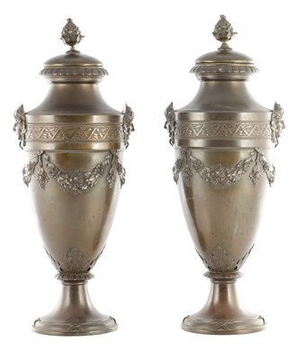 Lot 815 - A LARGE PAIR OF FRENCH PATINATED BRONZE LIDDED URNS
