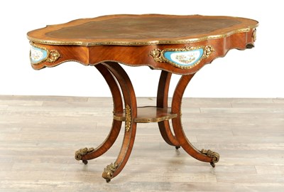 Lot 1734 - A GOOD 19TH CENTURY KINGWOOD AND ORMOLU MOUNTED PORCELAIN PANELLED SHAPED WRITING TABLE BEARING RETAILERS STAMP FOR S & H JEWELL 29,30,31 LITTLE QUEEN HOLBORN