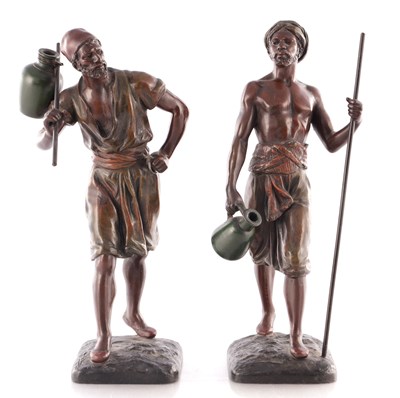 Lot 787 - MARCEL DEBUT (1865-1933). A PAIR OF EARLY 20TH CENTURY COLD PAINTED BRONZED SCULPTURES OF WATER CARRIERS
