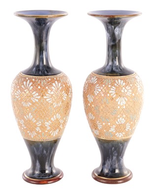 Lot 33 - A PAIR OF DOULTON LAMBETH STONEWARE OVOID VASES WITH SLENDER FLARED NECKS