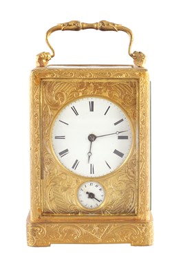Lot 1345 - AUGUSTE A PARIS. A MID 19TH CENTURY FRENCH GILT ENGRAVED STRIKING CARRIAGE CLOCK