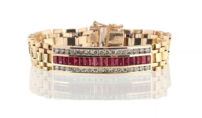 Lot 107 - AN ART DECO STYLE 14CT GOLD RUBY AND DIAMOND SET BRACELET