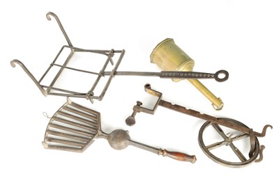 Lot 744 - A COLLECTION OF 18TH CENTURY FIREPLACE STEEL AND BRASS TRIVETS AND SPITJACK