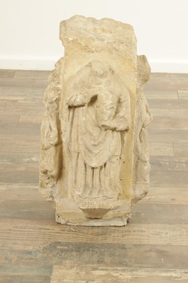 Lot 893 - A MEDIEVAL CARVED STONE PILLAR DECORATED WITH BISHOPS TO EACH SIDE
