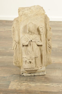 Lot 893 - A MEDIEVAL CARVED STONE PILLAR DECORATED WITH BISHOPS TO EACH SIDE