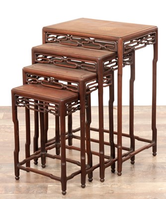 Lot 474 - A 19TH CENTURY CHINESE HARDWOOD NEST OF FOUR OCCASIONAL TABLES