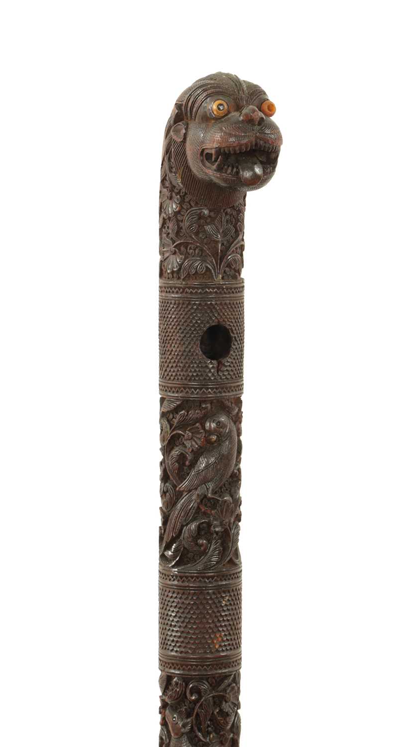 Lot 1085 - A 19TH CENTURY SOUTH INDIAN MYSORE CARVED SANDALWOOD WALKING STICK