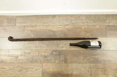 Lot 1085 - A 19TH CENTURY SOUTH INDIAN MYSORE CARVED SANDALWOOD WALKING STICK