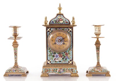 Lot 1584 - A LATE 19TH CENTURY FRENCH CHAMPLEVE ENAMEL CLOCK GARNITURE