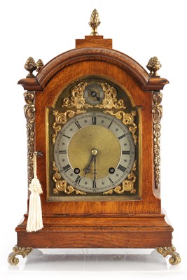 Lot 1485 - A LATE 19TH CENTURY GERMAN OAK CASED QUARTER CHIMING BRACKET CLOCK