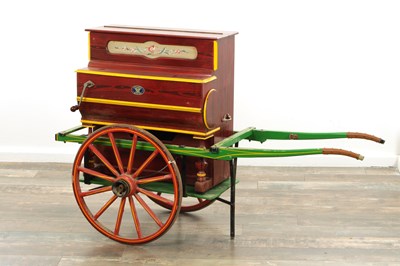 Lot 1037 - A MID 20TH CENTURY SPANISH MINIATURE BARREL PIANO ON HANDCART