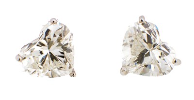 Lot 149 - A PAIR OF WHITE GOLD HEART SHAPED DIAMOND STUD EARRINGS