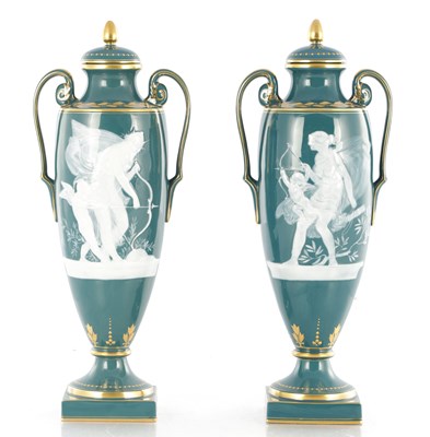 Lot 97 - A PAIR OF 20TH CENTURY MINTON BICENTENARY 1793-1993 PATE SUR PATE PORCELAIN NYMPH TRAINING CUPID BY ALBOIN BINKS LIDDED CABINET VASES
