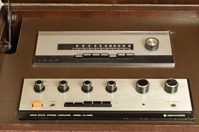Lot 1020 - A THORENS TD 124 TURNTABLE WALNUT MUSIC CABINET