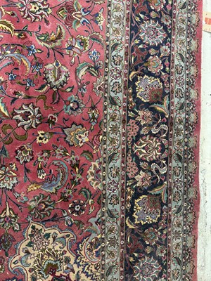 Lot 730 - A LARGE GOOD QUALITY PERSIAN PINK WOOL MEDALLION CARPET