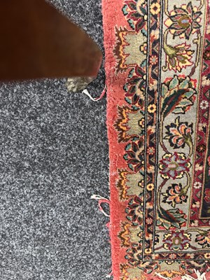 Lot 730 - A LARGE GOOD QUALITY PERSIAN PINK WOOL MEDALLION CARPET